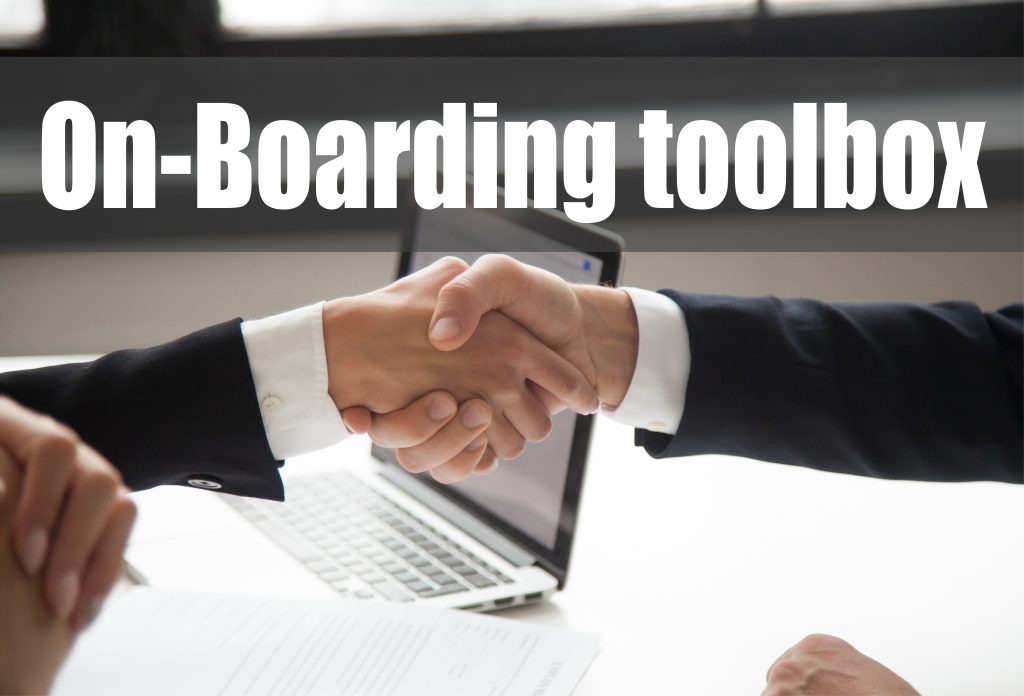 On-boarding-toolbox businessman handshaking businesswoman showing respect closeup view hands shaking 1 1024x696 1
